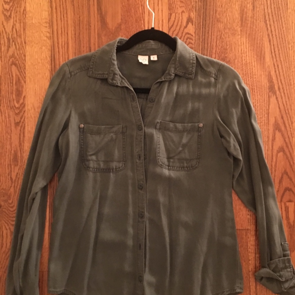 Green button up shirt